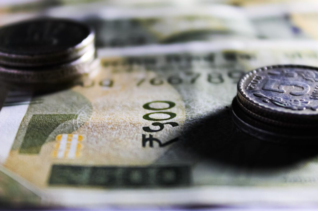 Indian currency rises