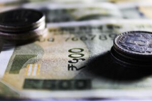 Indian currency rises